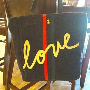 Ellen DeGeneres blue-gray Love bag